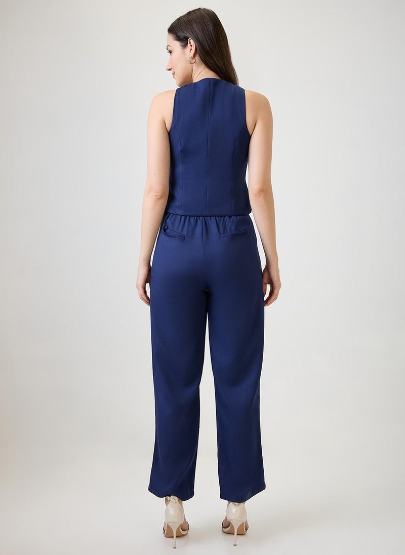 جلو باص طقم نسائي بلون كحلي من جلوبس، سترة بياقة على شكل حرف  وجيوب أمامية مع بنطلون، طقم عمل - Image 4